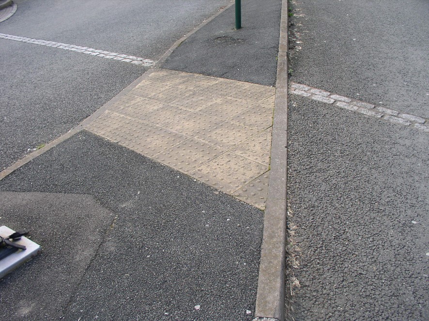 With dimpled surface for the partially sighted.