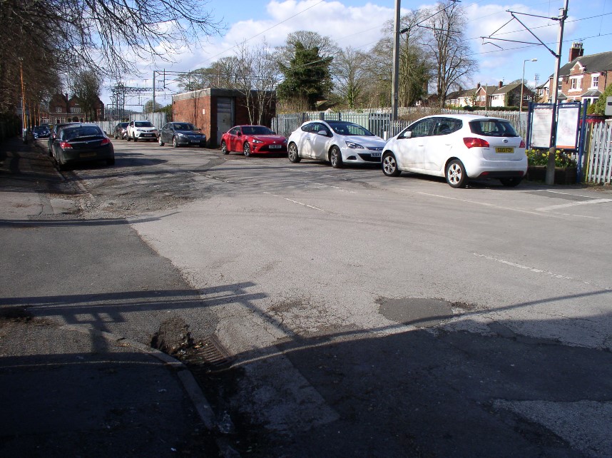 Some roadside spaces are for parking as here in Stone station approach.